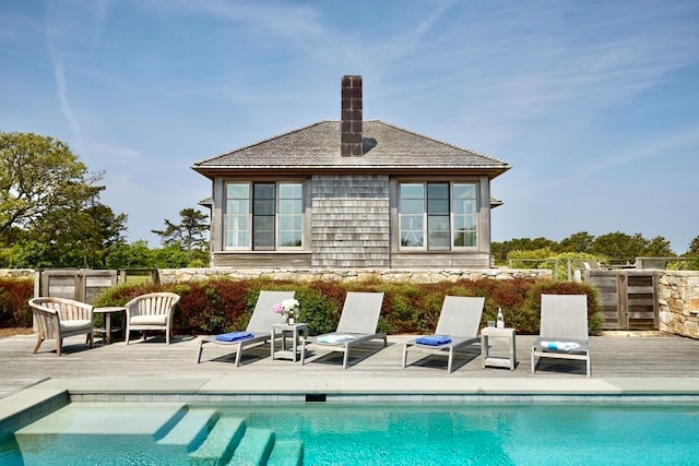 back of house with a patio