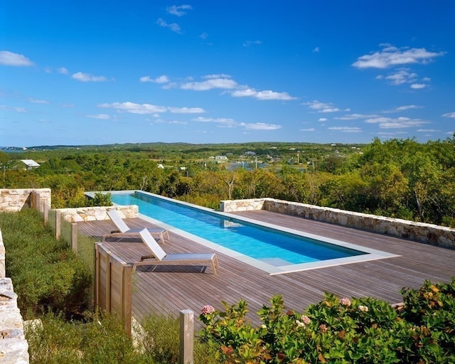 view of pool featuring a wooden deck