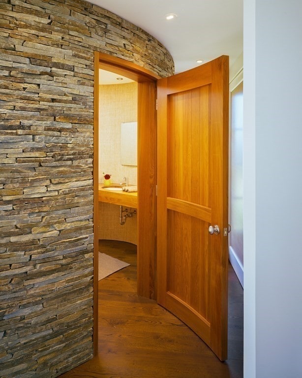 corridor with dark hardwood / wood-style floors and sink