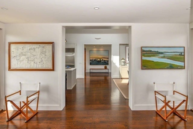 hall with dark hardwood / wood-style floors