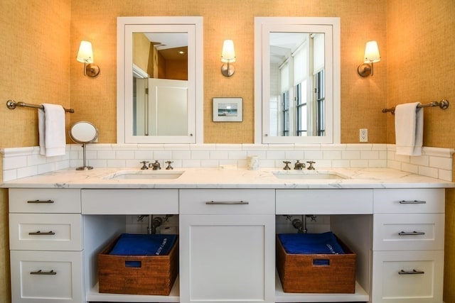 bathroom with backsplash and vanity