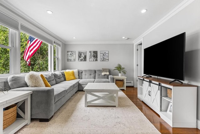 138 Dartmouth St, Everett, MA 02149 - living room with a baseboard heating unit, ornamental molding, recessed lighting, and wood finished floors