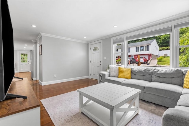 138 Dartmouth St, Everett, MA 02149 - living area featuring ornamental molding, recessed lighting, baseboards, and wood finished floors