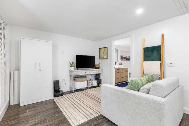 138 Dartmouth St, Everett, MA 02149 - living area with dark wood-style flooring and baseboards