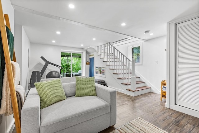 138 Dartmouth St, Everett, MA 02149 - living area with stairway, wood finished floors, recessed lighting, and baseboards