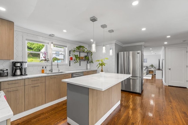 138 Dartmouth St, Everett, MA 02149 - kitchen with stainless steel appliances, a sink, dark wood-style flooring, tasteful backsplash, and ornamental molding