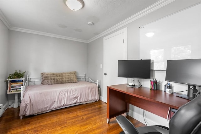 138 Dartmouth St, Everett, MA 02149 - bedroom with crown molding, wood finished floors, a desk, and baseboards