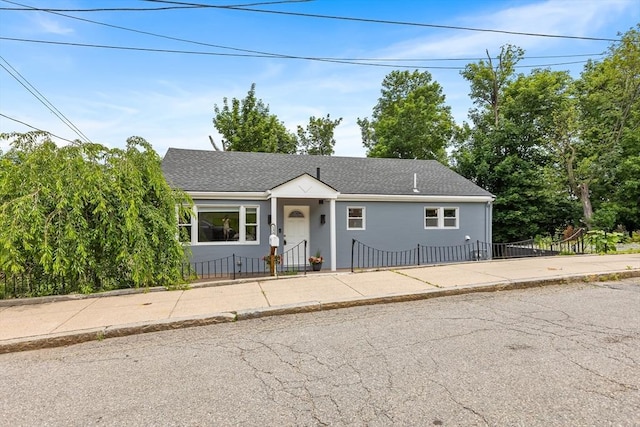 138 Dartmouth St, Everett, MA 02149 - view of front of house featuring a fenced front yard and roof with shingles