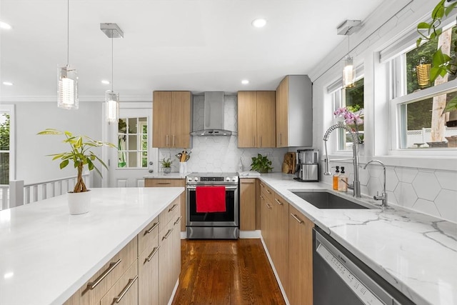 138 Dartmouth St, Everett, MA 02149 - kitchen featuring stainless steel appliances, wall chimney range hood, a sink, decorative backsplash, and dark wood-style flooring