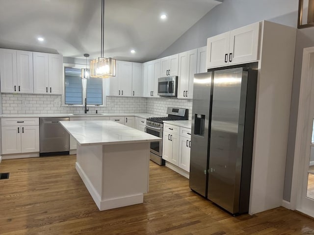 kitchen with white cabinetry, sink, and appliances with stainless steel finishes