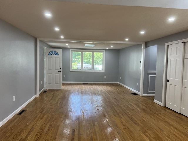 interior space featuring dark hardwood / wood-style flooring