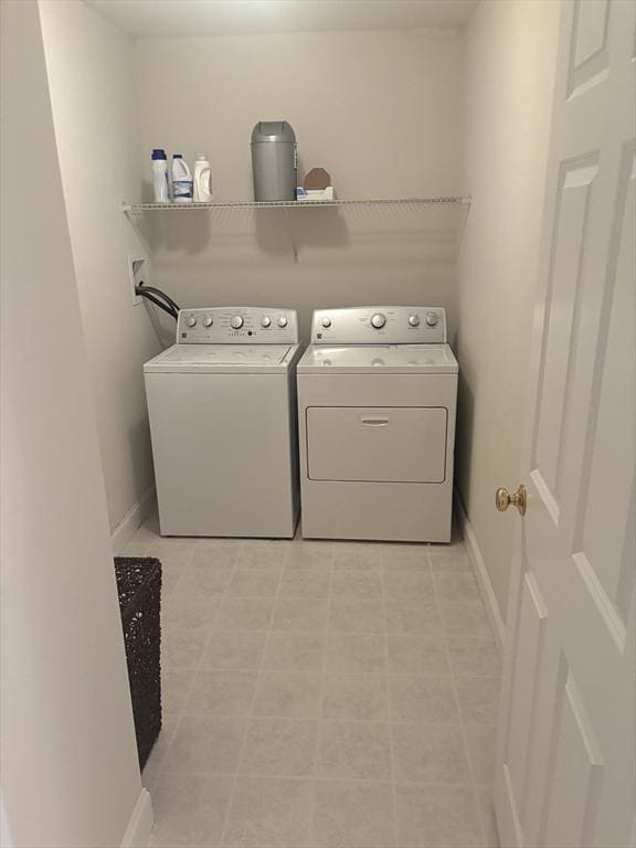 43 Longview Cir Unit B, Ayer, MA 01432 - laundry room featuring washer and clothes dryer and baseboards