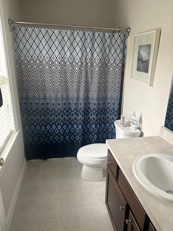 43 Longview Cir Unit B, Ayer, MA 01432 - full bathroom featuring vanity, toilet, and a shower with curtain