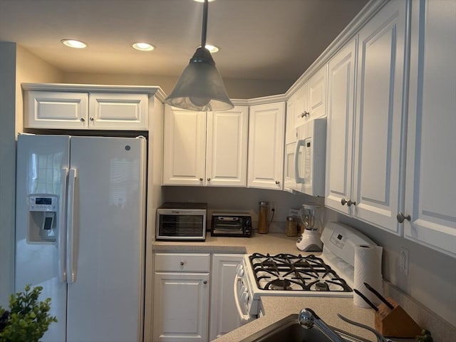 43 Longview Cir Unit B, Ayer, MA 01432 - kitchen with white appliances, light countertops, white cabinets, and recessed lighting