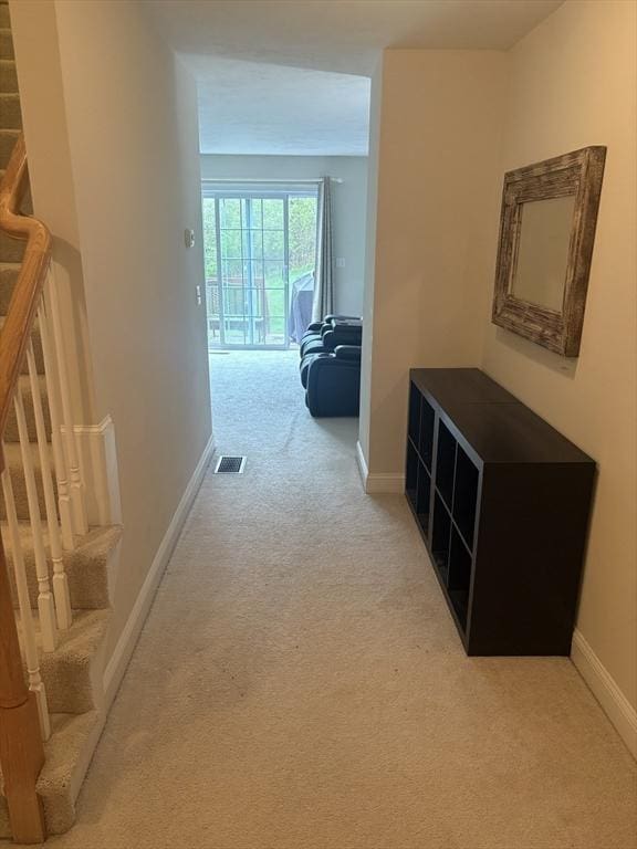 43 Longview Cir Unit B, Ayer, MA 01432 - hall with carpet floors, stairway, and baseboards