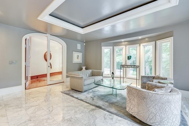 70 Lazell St, Hingham, MA 02043 - living area with arched walkways, plenty of natural light, and marble finish floors