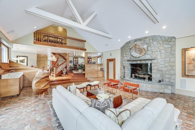 70 Lazell St, Hingham, MA 02043 - living area featuring high vaulted ceiling, a fireplace, stairway, and beamed ceiling