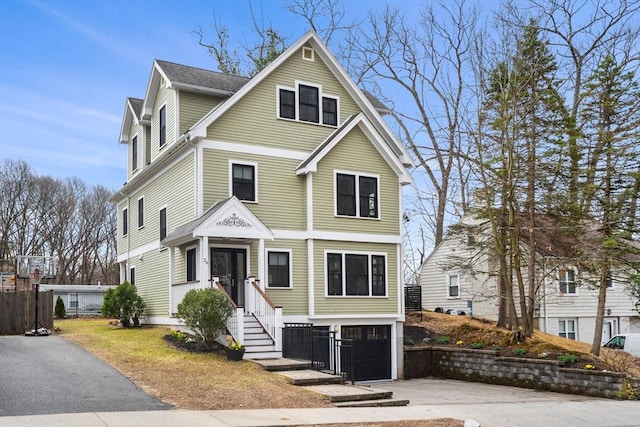 26A Goddard St, Newton, MA 02461 - view of front of property with concrete driveway and a garage