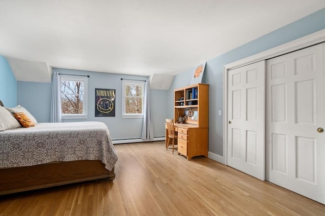 4 Old Meadow Ln, Harvard, MA 01451 - bedroom with a closet, light wood finished floors, and a baseboard radiator