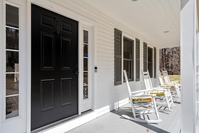 4 Old Meadow Ln, Harvard, MA 01451 - property entrance featuring a porch