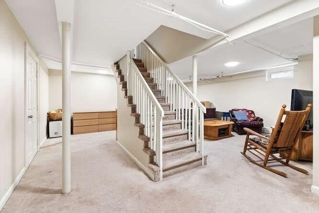 basement with light colored carpet