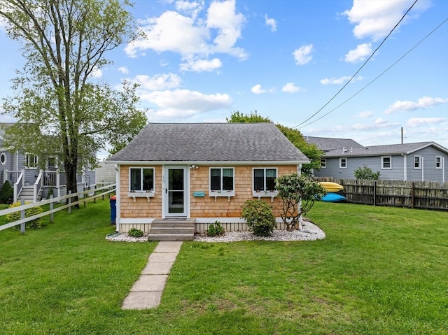 13 Hathaway St, Fairhaven, MA 02719 - view of front of home featuring roof with shingles and entry steps
