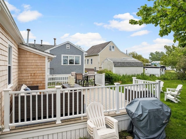 13 Hathaway St, Fairhaven, MA 02719 - wooden terrace with a grill and outdoor dining area