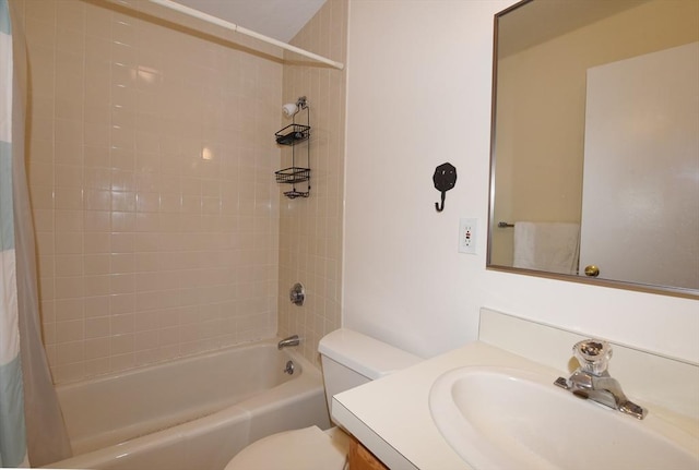 full bathroom featuring vanity, shower / tub combo, and toilet