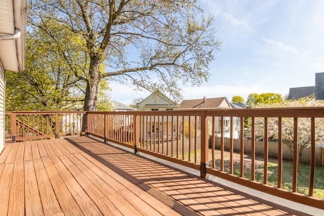 deck with a fenced backyard