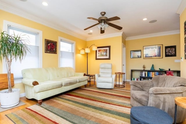 living room with ceiling fan, wood finished floors, baseboards, ornamental molding, and recessed lighting