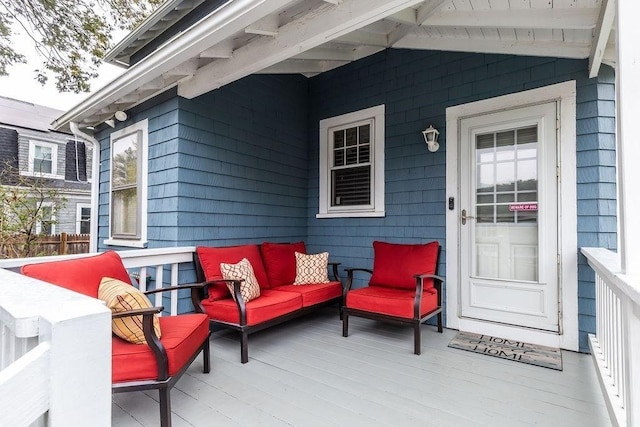 view of patio / terrace with a wooden deck and an outdoor hangout area