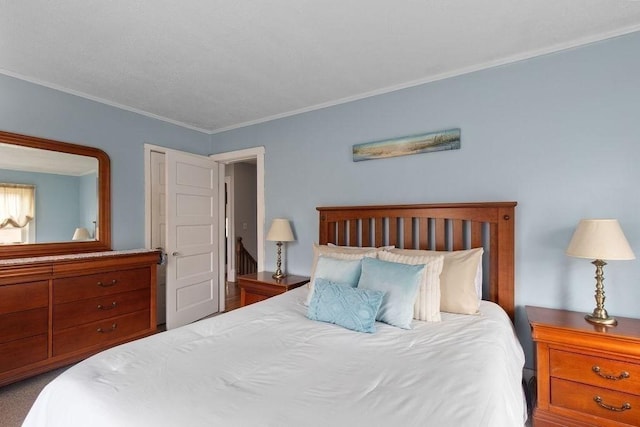 bedroom featuring crown molding