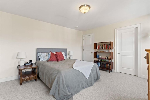 bedroom with light carpet