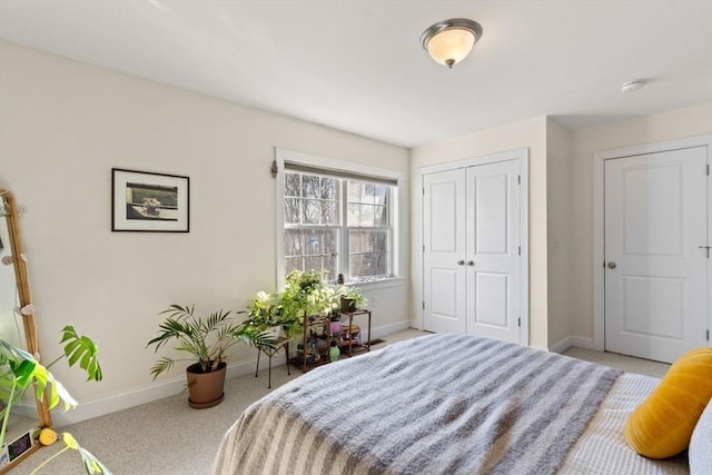 carpeted bedroom featuring a closet