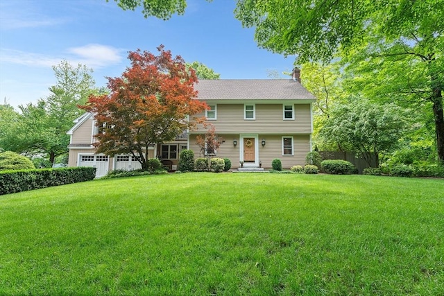 6 Fruit St, Hopkinton, MA 01748 - colonial house with a front lawn and a chimney