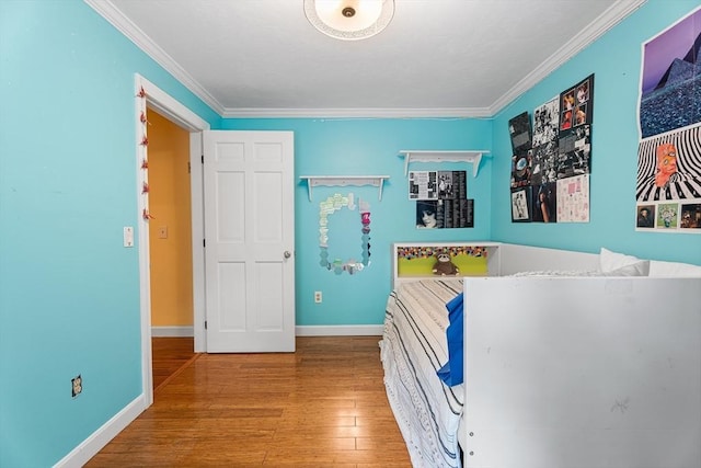 6 Fruit St, Hopkinton, MA 01748 - bedroom featuring crown molding and wood finished floors