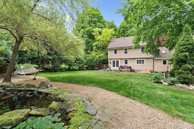 6 Fruit St, Hopkinton, MA 01748 - view of grassy yard with french doors and a patio