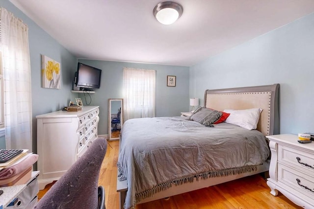 bedroom featuring light wood-type flooring