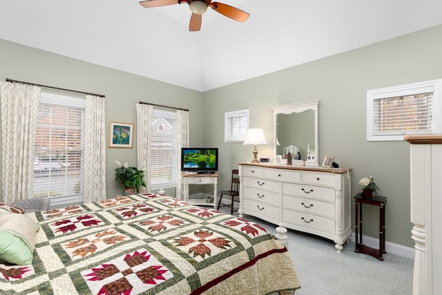 bedroom with ceiling fan and light carpet