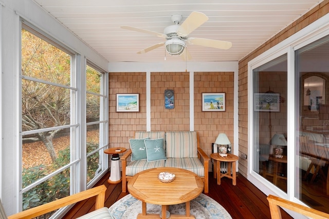 sunroom / solarium with ceiling fan