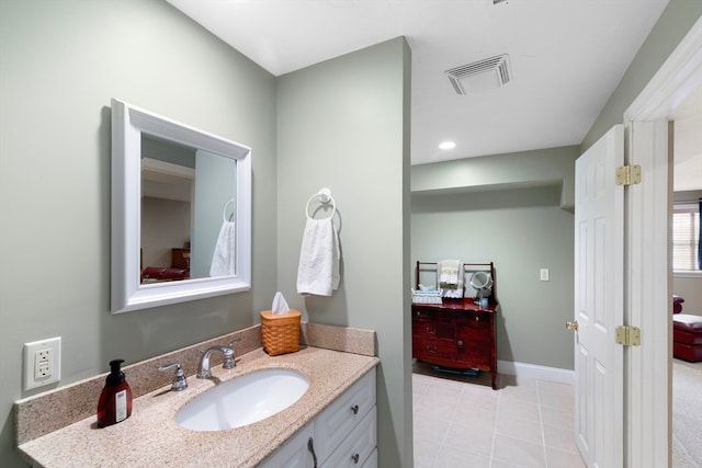 bathroom with vanity and tile patterned floors