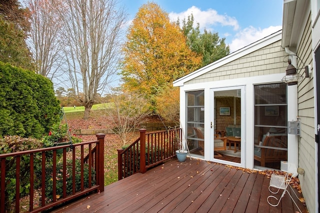 wooden terrace with a sunroom