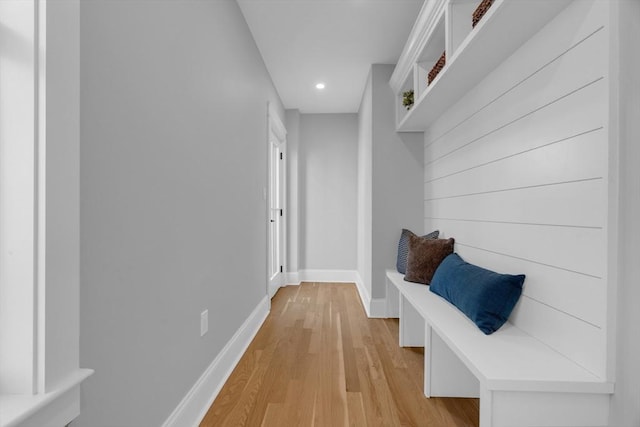 mudroom with light hardwood / wood-style flooring