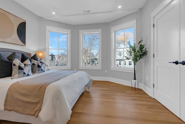 bedroom with light wood-type flooring