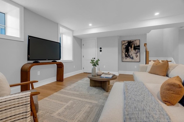 living room with light hardwood / wood-style flooring