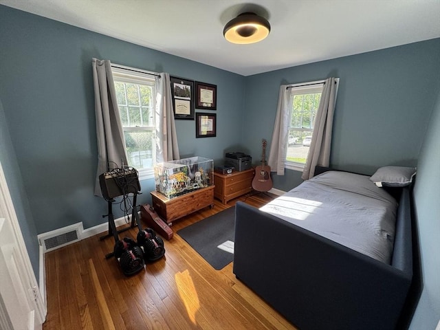 167 Pleasant St, East Longmeadow, MA 01028 - bedroom featuring hardwood / wood-style floors, baseboards, and a desk