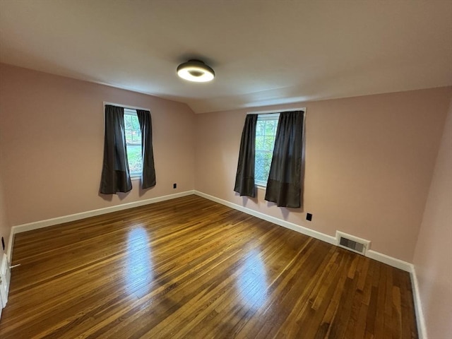 167 Pleasant St, East Longmeadow, MA 01028 - empty room with dark wood-type flooring and baseboards