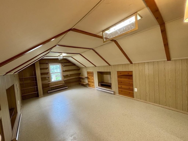 167 Pleasant St, East Longmeadow, MA 01028 - bonus room featuring wooden walls, a baseboard heating unit, vaulted ceiling, and baseboard heating
