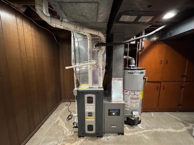167 Pleasant St, East Longmeadow, MA 01028 - utility room featuring water heater