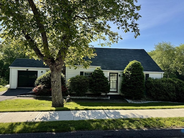 167 Pleasant St, East Longmeadow, MA 01028 - view of front of house with an attached garage, driveway, and a front yard